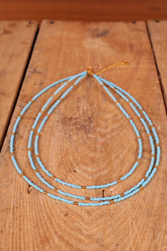 Triple Strand Seed Bead Necklace With Gold Accents